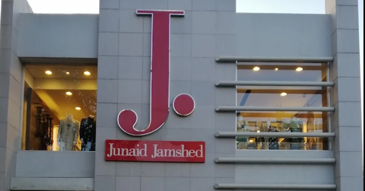 J.
